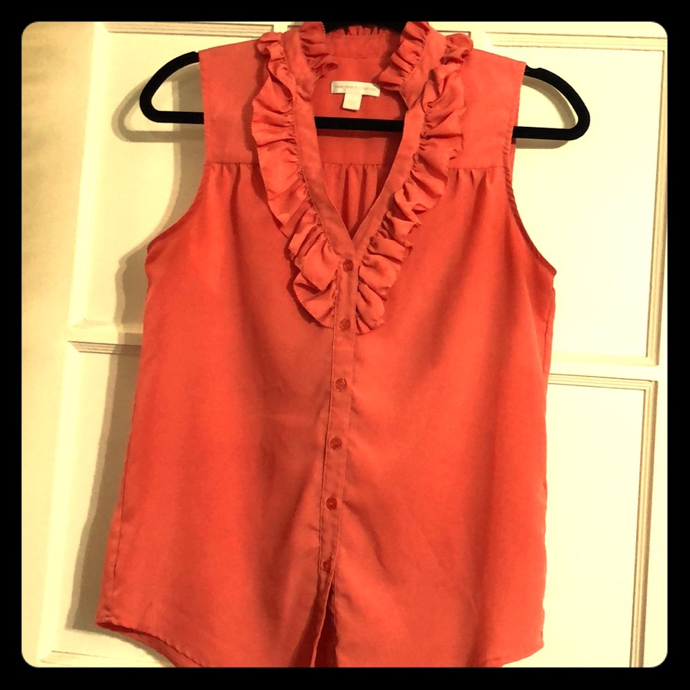 Coral blouse with ruffle detail